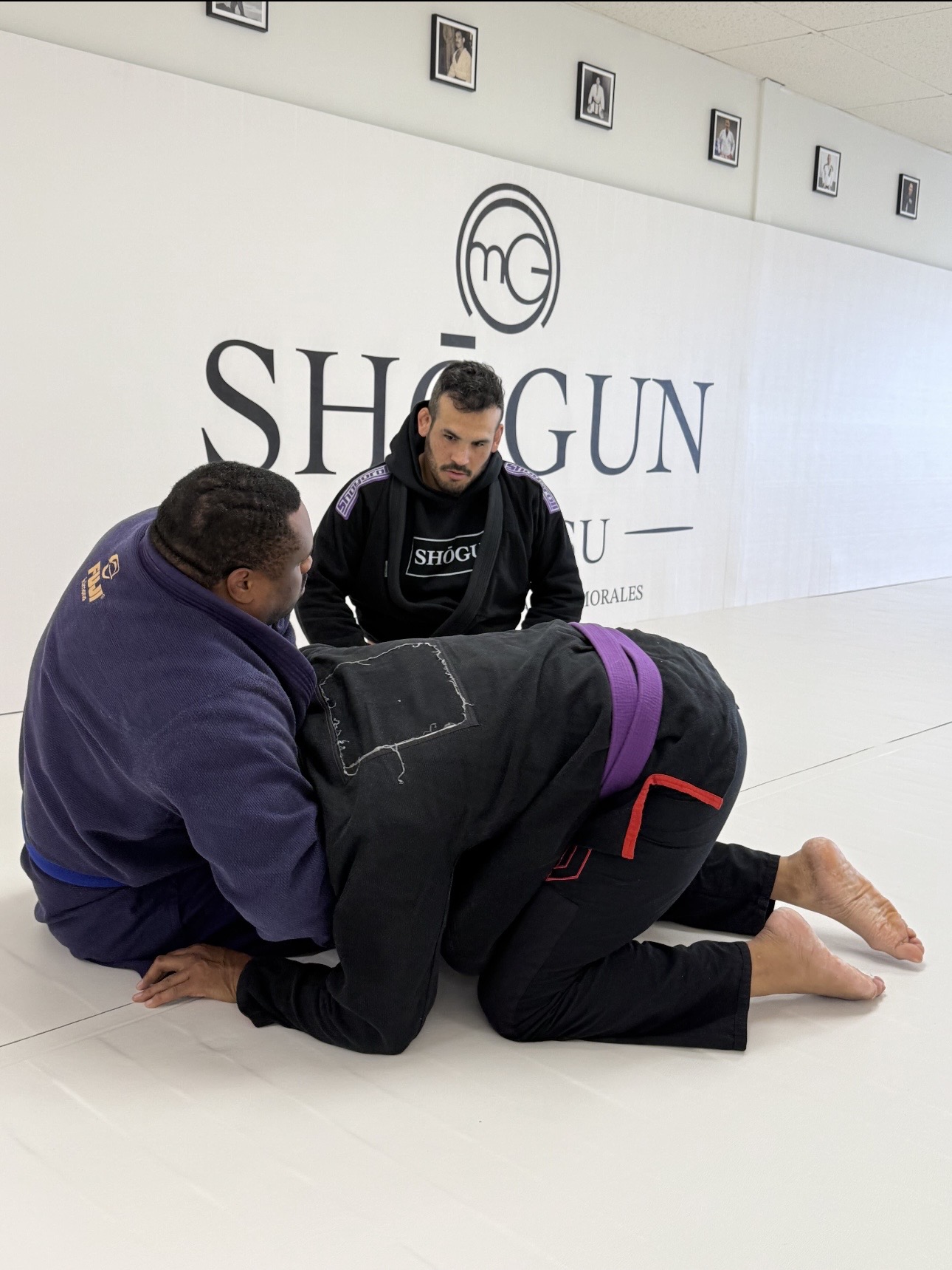 Coach Manuel watching a roll